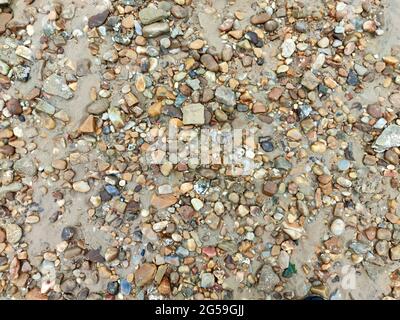 groups of small colorful pebbles on the beach in Rizhao of china Stock Photo