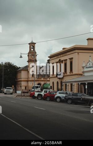 Beechworth, Victoria - December 22nd, 2020: The old Bank of Victoria building and Post Office building with a clock tower on the main street. Stock Photo