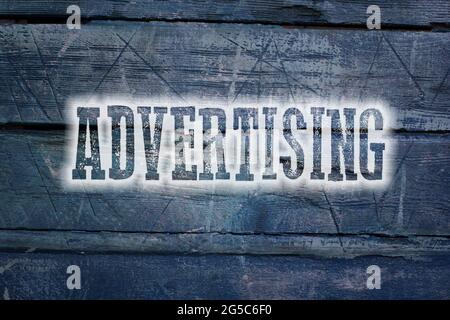 Advertising concept text on background Stock Photo