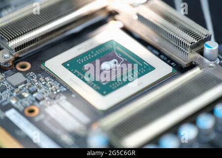 Thermal paste lying on microchip for video card closeup Stock Photo