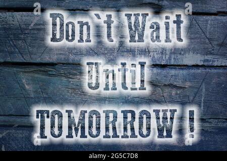 Don't Wait Until Tomorrow Concept text on background Stock Photo