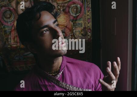 Ecuadorian young man posing inside the mandir Stock Photo