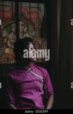 Ecuadorian young man posing inside the mandir Stock Photo
