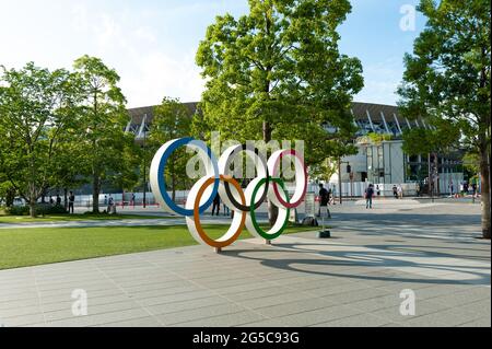Tokyo, Japan. Olympic rings in front of the new national stadium 