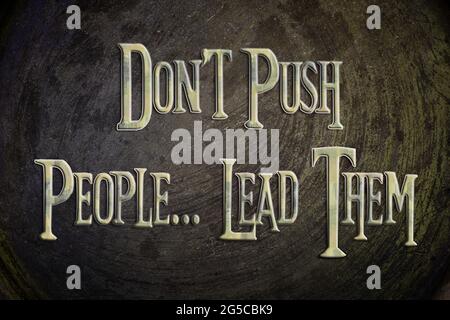 Don't Push People Lead Them Concept text on background Stock Photo