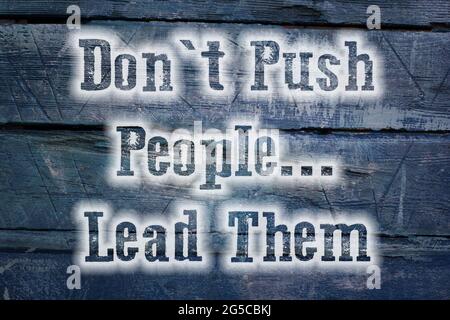 Don't Push People Lead Them Concept text on background Stock Photo