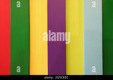 Multi-colored vertical stripes pattern wooden wall for abstract background Stock Photo