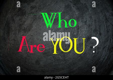 Who are you handwritten with white chalk on a blackboard Stock Photo