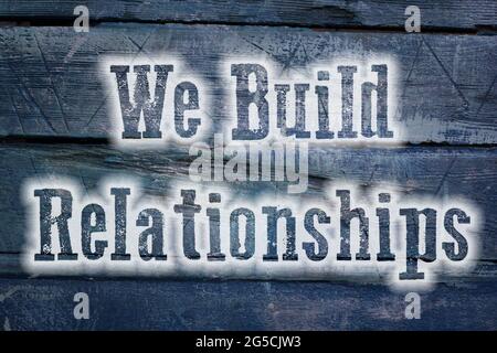 We Build Relationships Concept text on background Stock Photo