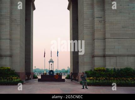 Indian army guards on alert in front of India Gate, World War 2 memorial, in Delhi, India. Stock Photo