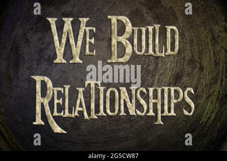 We Build Relationships Concept text on background Stock Photo