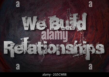 We Build Relationships Concept text on background Stock Photo