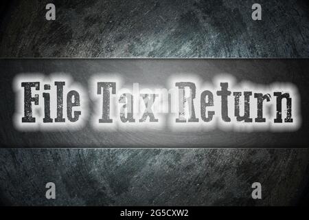 File Tax Return Concept text on background Stock Photo