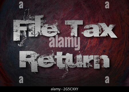 File Tax Return Concept text on background Stock Photo