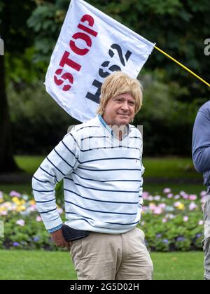 LICHFIELD. UK.  26th JUNE 2021.  HS2 Rebellion Stop HS2 rally in Beacon Park, Lichfield, marks the beginning of an 8 day walk to Wigan to raise awareness of the Stop HS2 campaign. Conservative MP Michael Fabricant speaks in support of the protestors efforts .  Credit: Richard Grange / Alamy Live News Stock Photo