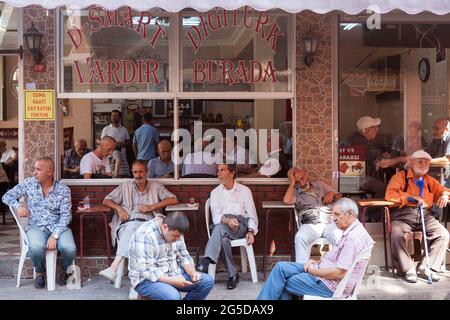 Men at a tea house (cay evi) in the Balat district of Istanbul, Turkey Stock Photo