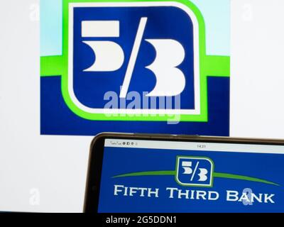 In this photo illustration, a Fifth Third Bank logo seen displayed on a smartphone. Stock Photo