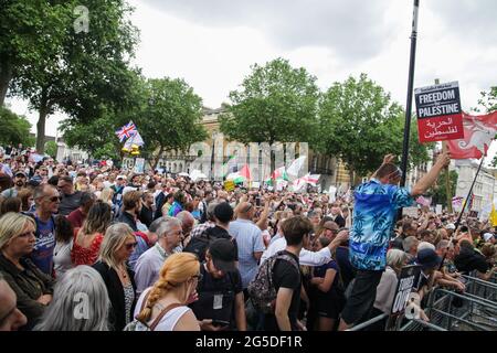 London, UK, 26th June, 2021. Anti-lockdown protestors march through the capital. Stock Photo