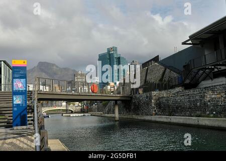 The city of Cape Town and Table Mountain as viewed from the canal at Battery park and the V&A Waterfront in the Cape Town harbour district. Stock Photo