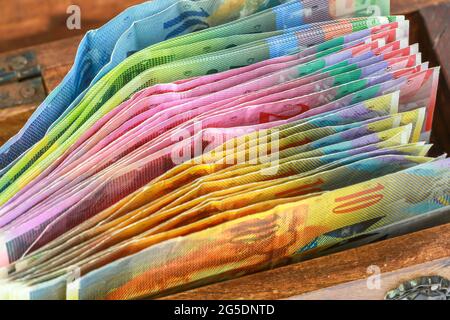 treasure chest with swiss franc banknotes Stock Photo