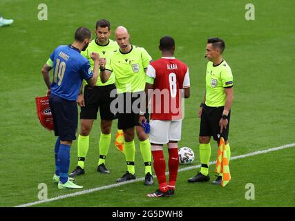 London, England, 26th June 2021. English referee Anthony Taylor hosts the coin toss during the UEFA European Championships match at Wembley Stadium, London. Picture credit should read: David Klein / Sportimage Stock Photo