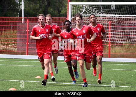 HENGELO, NETHERLANDS - JUNE 26: Wout Brama of FC Twente, Gijs Smal of FC Twente, Queensy Menig, Kik Pierie of FC Twente and Jayden Oosterwolde of FC Twente during the first Training Session of FC Twente of season 2021-2022 at Trainingscentrum Hengelo on June 26, 2021 in Hengelo, Netherlands. (Photo by Marcel ter Bals/Orange Pictures) Stock Photo