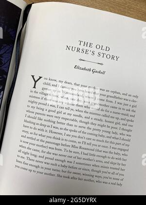 Opening text of The Old Nurse's Story by Elizabeth Gaskell in a book with a collection of ghost stories Stock Photo