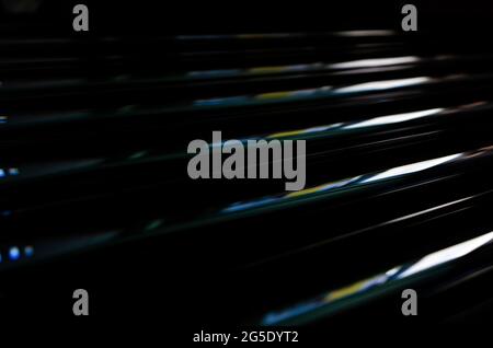 abstract dark black background with shiny metallic lines pattern Stock Photo