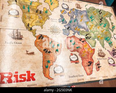 Risk - A family a strategy board game of diplomacy, conflict and conquest - world map - One of the Best selling games Stock Photo