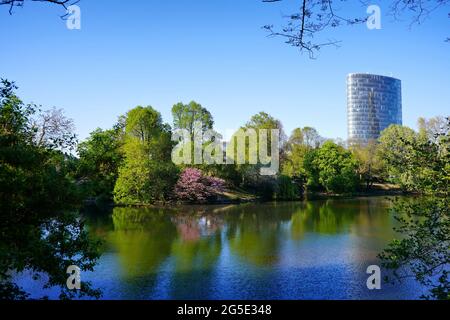 Schwanenspiegel public park in Düsseldorf, Germany, with modern office building in the background. The historic park was created around 1842. Stock Photo