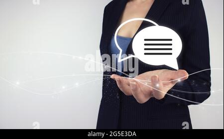 Concept of challenging issues. Hand hold digital hologram Business email on grey background. Technical Support Center Customer Service Concept Stock Photo