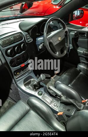 Yeovil, Somerset, UK – June 18 2021. Close and selective focus on the leather interior of an Alfa Romeo sports car Stock Photo