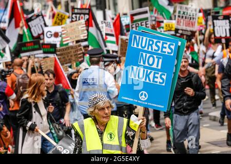 London, UK. 26th June, 2021. London, UK on June 26, 2021: Anti-government activists protest at Regent Street in the centre of the city. The protest unites activists from many opposition left wing movements such as Kill the Bill, The People's Assembly, NHS Staff Voices, Stop the War Coalition or Extintion Rebellion. (Photo by Dominika Zarzycka/Sipa USA) Credit: Sipa USA/Alamy Live News Stock Photo