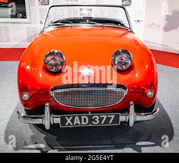 Yeovil, Somerset, UK – June 18 2021. Front on view of a classic red convertible sports car Stock Photo