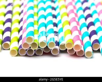 Stripped Paper Straws on a White Background Stock Photo