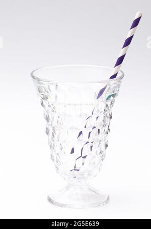 Stripped Paper Straws on a White Background Stock Photo