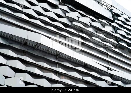 modern Aluminium composite material architecture gray color and Hexagon shape popup texture on exterior facade building. Stock Photo