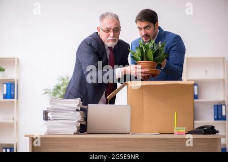 Two employees in dismissal concept Stock Photo