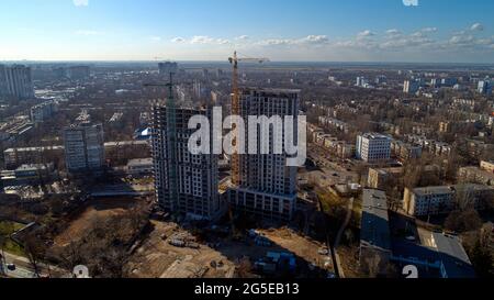 Construction of high-rise residential building. Aerial view of construction of high-rise apartment building. Stock Photo