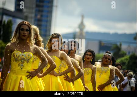 San Salvador, El Salvador. 26th June, 2021. Transgender cheerleaders perform during the Pride March.Members of the LGBT community took to the streets to perform in an annual Pride Parade celebrating diversity and protest for human rights laws to be approved by Congress. (Photo by Camilo Freedman/SOPA Images/Sipa USA) Credit: Sipa USA/Alamy Live News Stock Photo