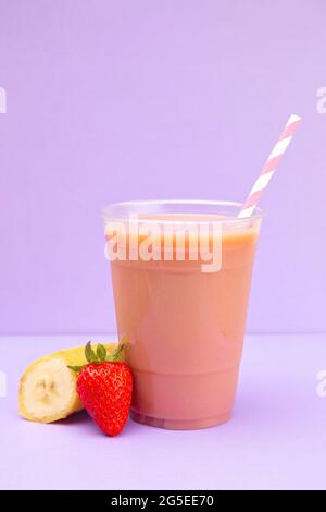 Two Glasses of Smoothie on Table. Vertical. Stock Photo by fucsiya