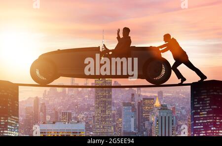 The teamwork concept with businessman pushing car Stock Photo