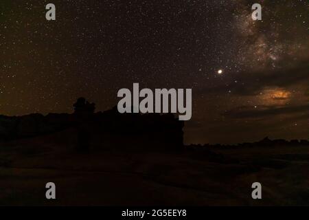 Hoodoo rock formation under the stars in Goblin Valley State Park, Utah Stock Photo