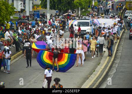 San Salvador, El Salvador. 26th June, 2021. General view of members of the LGBT community marching.Members of the LGBT community march to celebrate pride day months after the Salvadoran Congress archived various law's that would benefit the LGBT community. Credit: Camilo Freedman/ZUMA Wire/Alamy Live News Stock Photo