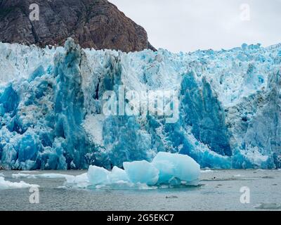Exploring the tidewater glacier of South Sawyer glacier by zodiac in Tracy Arm wilderness area, Tongass National Forest, Alaska USA Stock Photo
