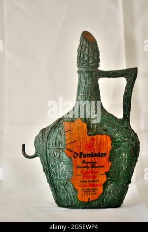 An empty bottle of O Fundador Cashew Fenny, displayed on the White background Stock Photo