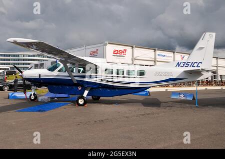 Cessna C-208B Grand Caravan utility plane N351CC displayed at the Farnborough International Airshow trade show 2012, UK. Fitted with cargo pod Stock Photo