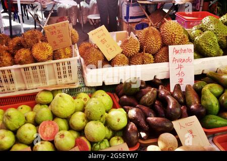 Malays vendor sale fruits vegetables for malaysian people and foreign travelers select buy eat in local shop at Filipino Market Kota Kinabalu bazaar a Stock Photo