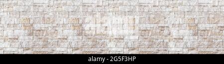 Panoramic Wide angle brown white beige travertine wall brick wall art concrete or stone texture background Stock Photo