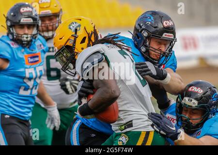 Poland. 26th June, 2021. European League of Football: Panthers Wroclaw (blue shirts) vs Leipzig Kings (white shirts) at the Olympic Stadium in Wroclaw, Poland on June 26th 2021 Pictured: Jason Rilwann Aguemon (2), Karlis Brauns (94) Credit: Piotr Zajac/Alamy Live News Stock Photo